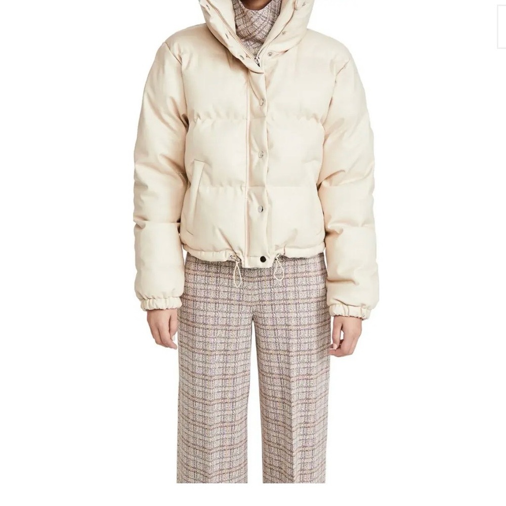 En Saison beige puffer jacket.